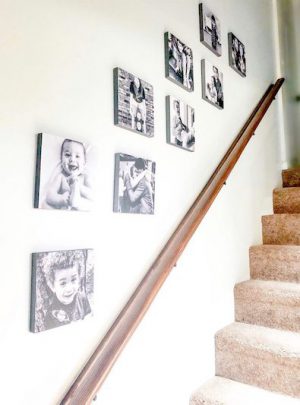 Stick photo tiles on your stairway.